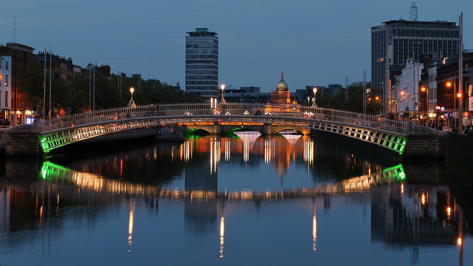 The Ha'penny Bridge over the River Liffey in Dublin at dusk